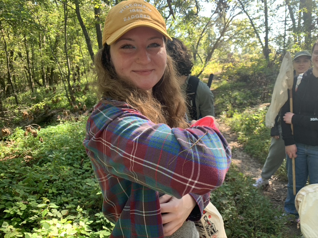 student with stick insect