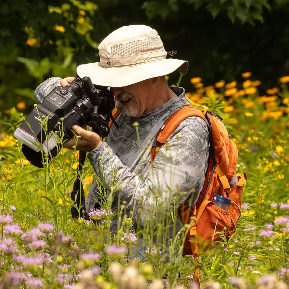 photographer in a prairie