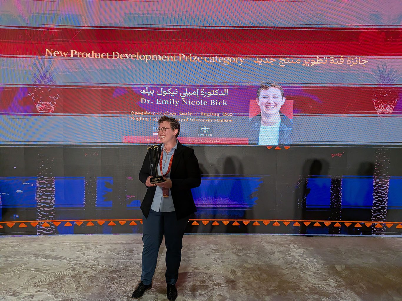 professor Emily Bick receiving an award